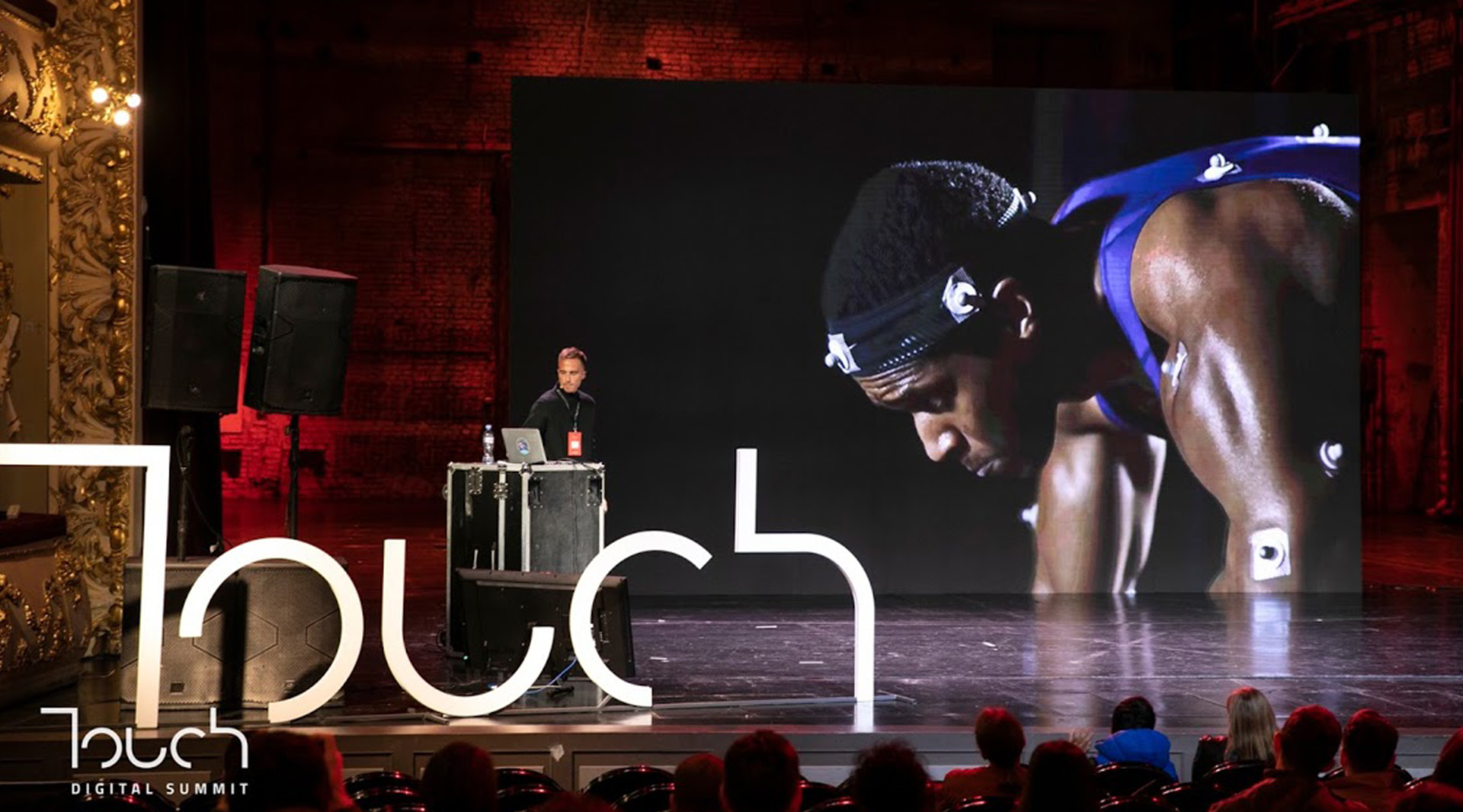 Lysandre FOLLET on stage at TOUCH 2019 speaking on Augmented creativity at NIKE